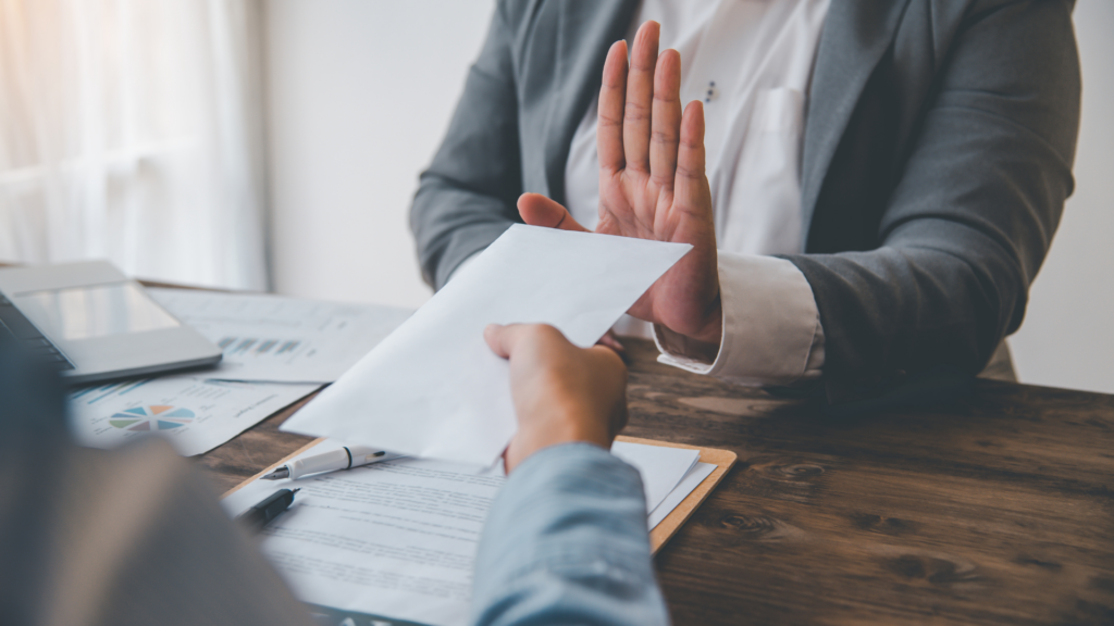 Individual refusing to accept court papers during an attempted service of process.