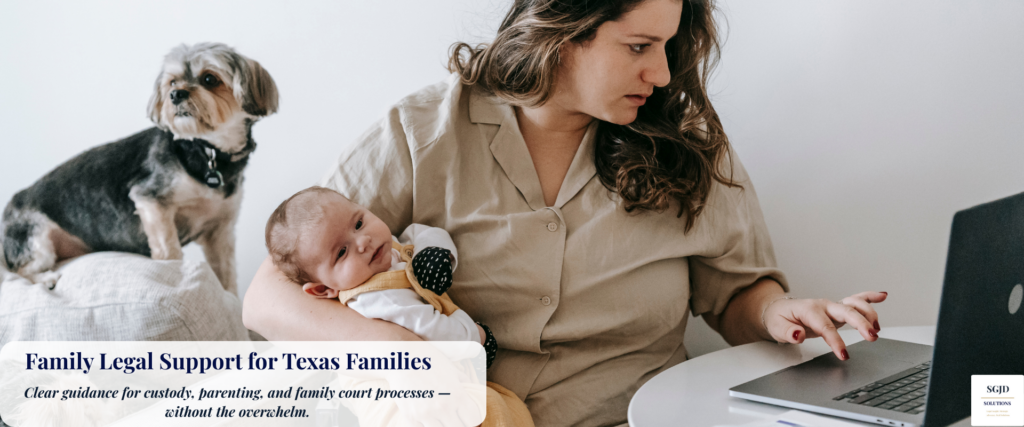 Parent holding a newborn while reviewing paperwork on a laptop at home, representing family legal planning and support.