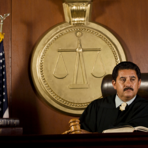 Judge issuing a court order after proper service of process in a Texas SAPCR case