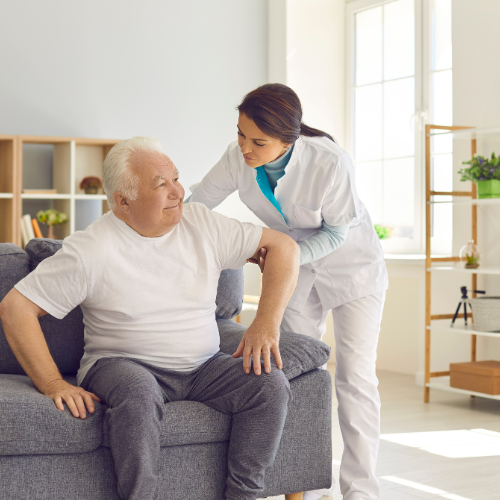 Home health aide assisting elderly client