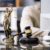 The Breakdown SGJD web image Lady Justice statue and gavel on legal desk — symbolizing legal analysis and advocacy
